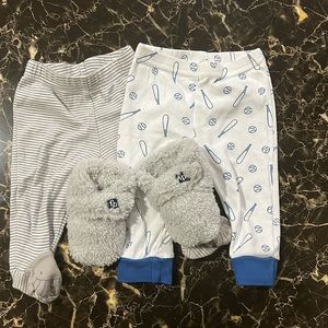 2 pair pants and a pair of slippers